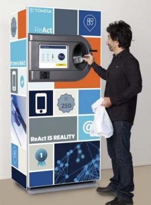 man using a reverse vending machine